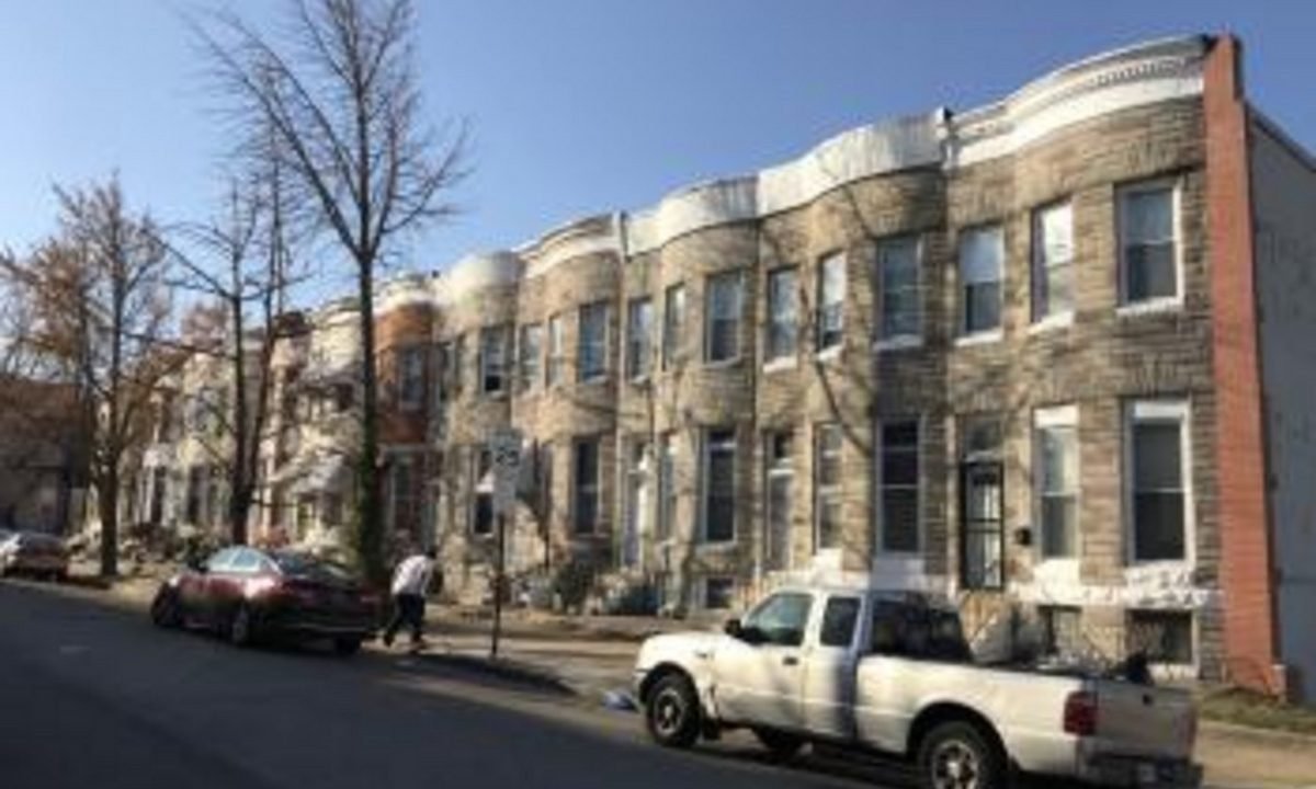 Real Baltimore rowhouse streetscape selected as an architectural reference for Damascus-area townhome care
